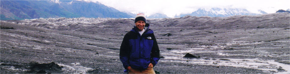 Robert Ivan standing atop Chisana Glacier, Alaska